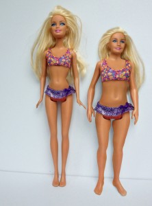 Barbie doll on the left, Lammily doll on the right. 