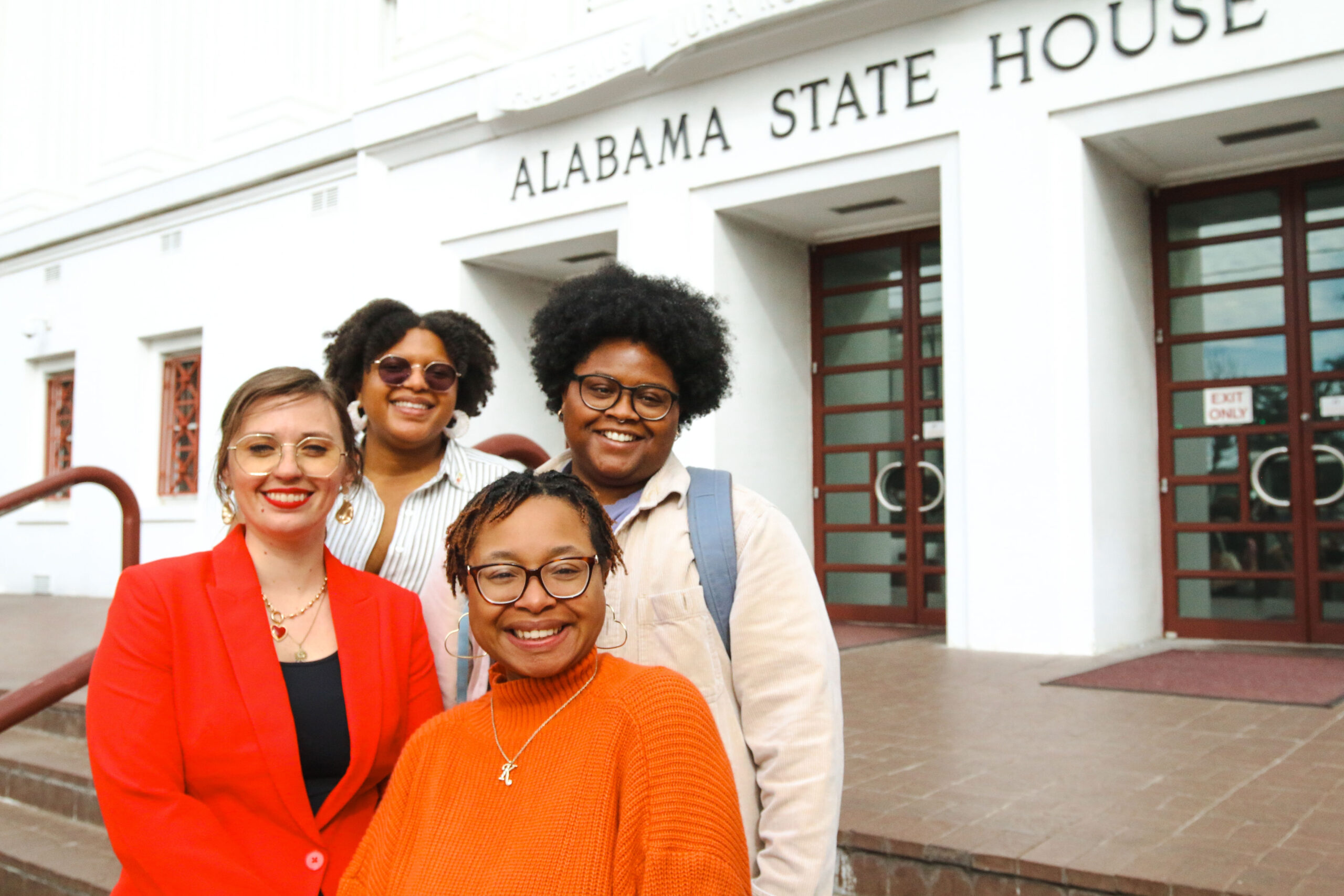 URGE advocates in front of the Alabama State House