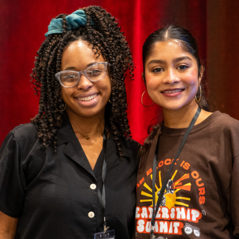 Two young URGE advocates smiling at URGE's leadership summit