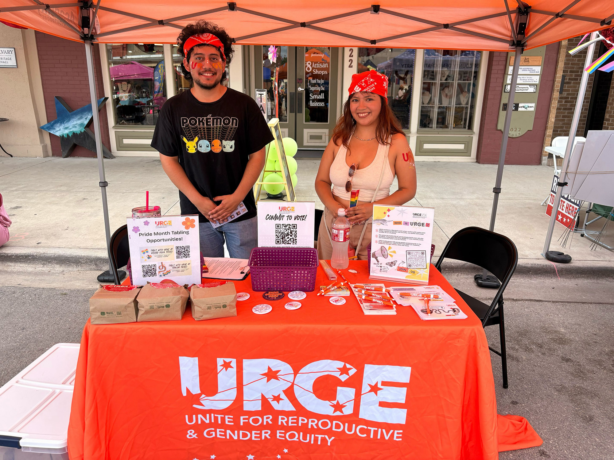 URGE information table with voting handouts.